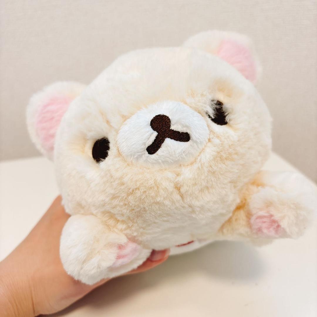 Korilakkuma soft stuffed toy lying on its stomach