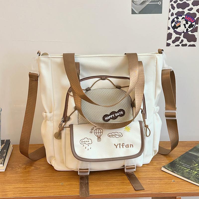 Schoolbag female high value versatile high school student embroidery style cute junior high school student backpack large capacity backpack