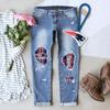 Stylish New Winter Printed Ripped Mid-Waist Women's Denim Jeans