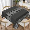 One rectangular tablecloth with a luxurious black and white floral print - made of durable polyester fabric.