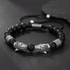 A men's handmade beaded braided bracelet, leopard head vintage jewelry suitable for men's daily wear