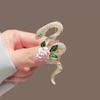 Women's snake-wrapped camellia brooch