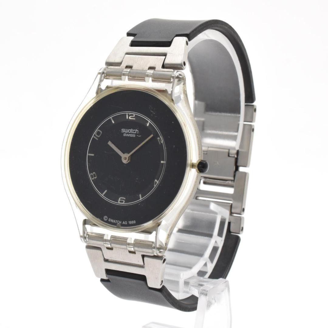 Used Working item swatch ladies watch black dial thin skin