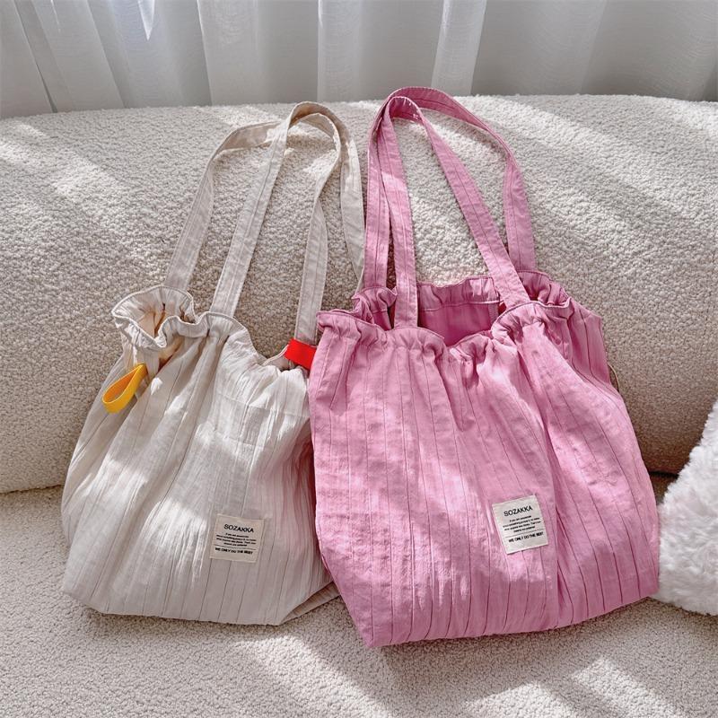 New striped drawstring shoulder bag lazy wind tote cloth bag large capacity commuter bag student class bag