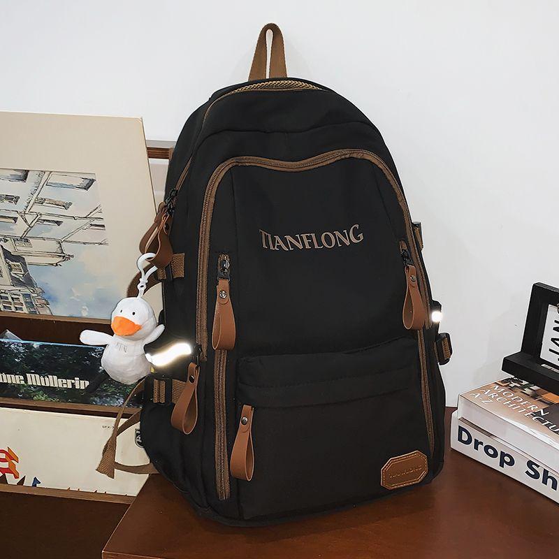 

Lightweight Burden Alleviation Schoolbag Male Junior High School Student New Arrival Large Capacity College Students Backpack Female Travel Backpack Classy Black + Send White Duck