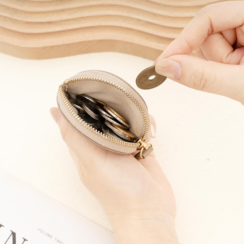New first-layer cowhide change bag, large-capacity portable jewelry bag, zipper, Japanese coin bag, genuine leather.