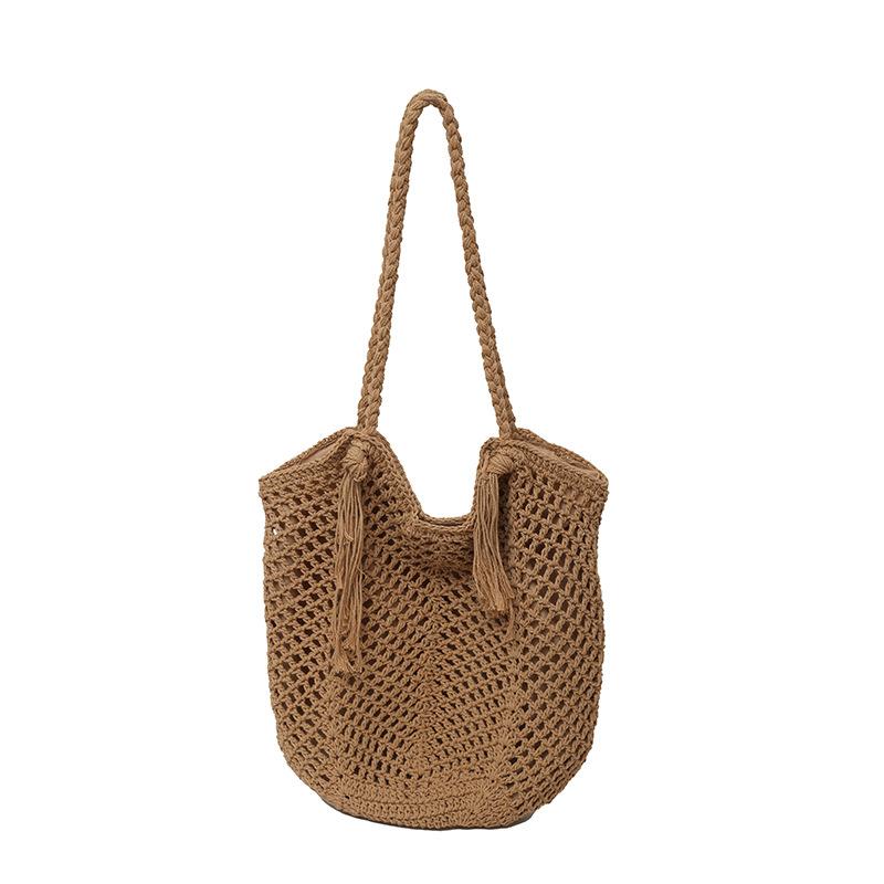 Hohle Quaste Stroh gewebte Tasche Damen handgewebte Tasche große Kapazität Tragetasche lässige Damen Schulter Urlaubstasche