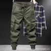 Casual overalls men's spring and autumn loose tied feet multi-pocket solid color overalls men