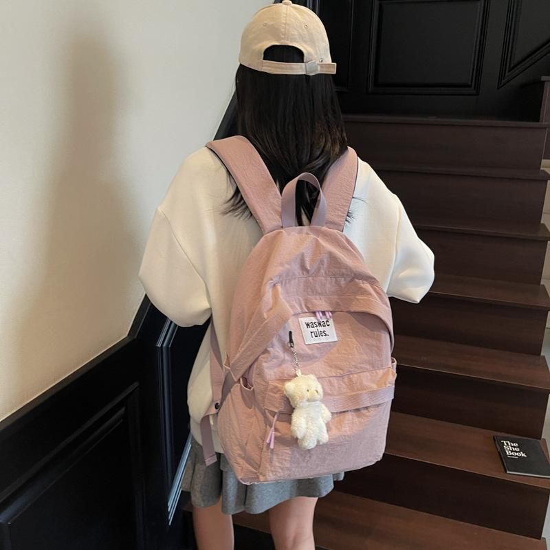 Niche ins style schoolbag female college student Japanese casual large-capacity backpack junior high school student simple design backpack