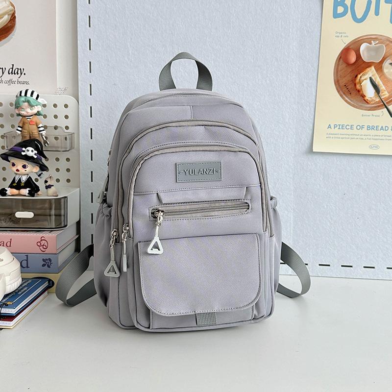 Schoolbag high-value junior high school large-capacity schoolbag female high school college student niche backpack simple versatile computer backpack