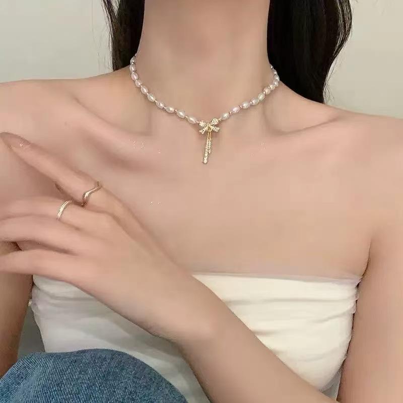 Bow pearl necklace women's new trendy niche design high-end clavicle chain light luxury temperament neck chain