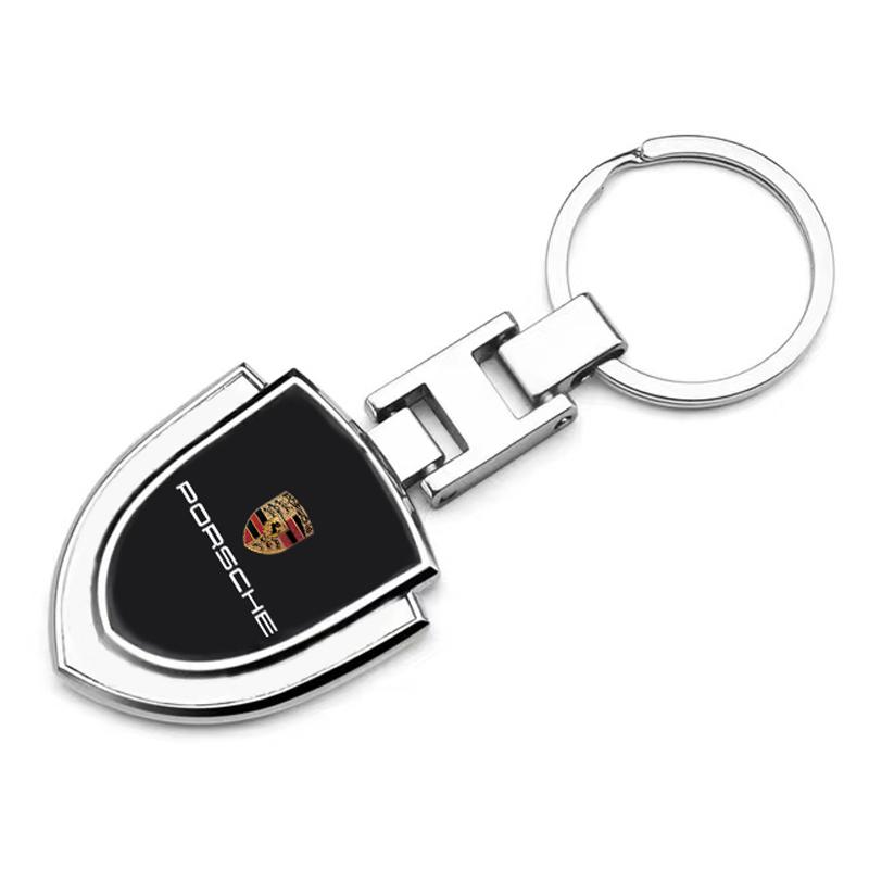 1Pcs Car Emblem Stying Metal Key Rings Shield Shaped Keychain For Porsche Cayenne Panamera Macan Boxster 911 Carrera-GT 944 918 917
