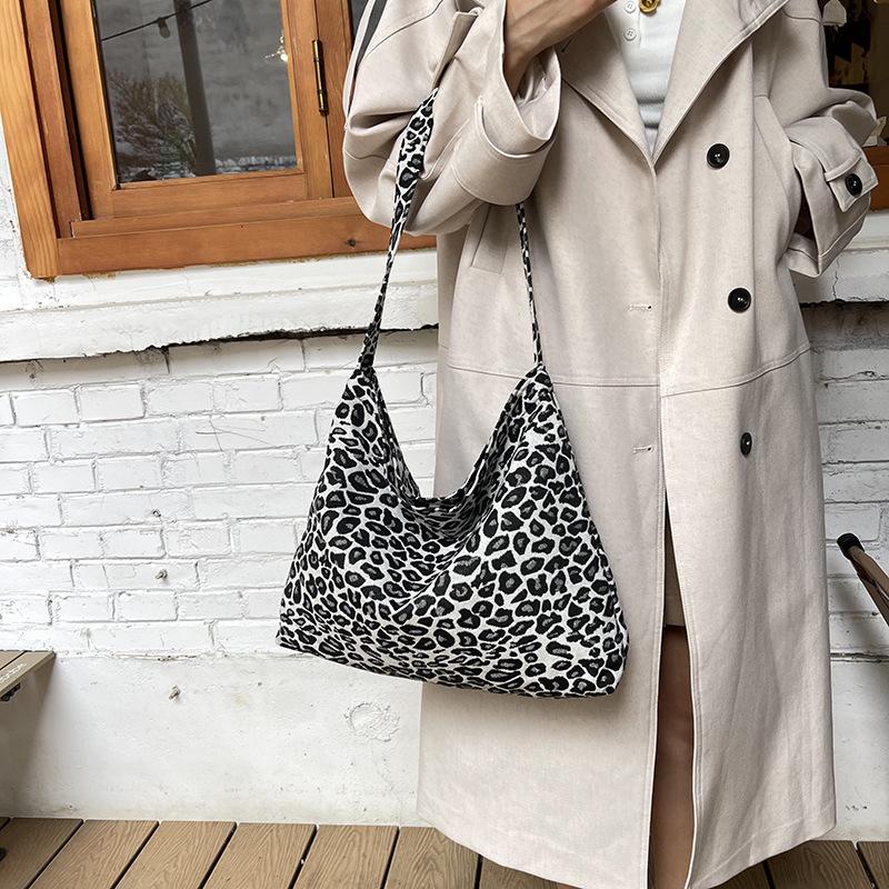 

Leopard print nylon bag women s new large-capacity messenger bag class commute shoulder armpit tote bag