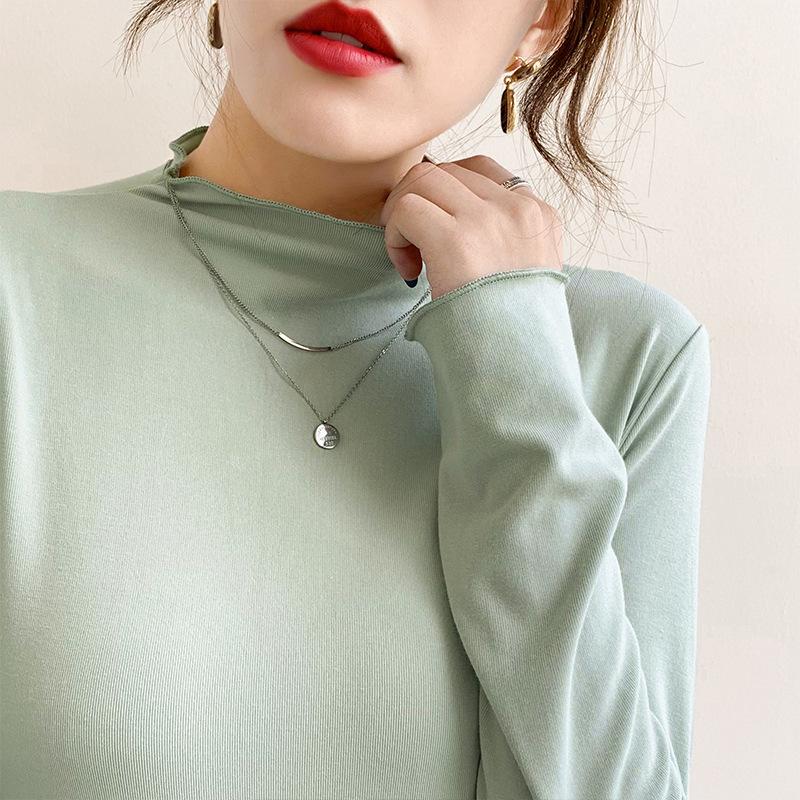 

Женская модальная полуводолазка на весну, осень и зиму. Белая футболка с длинными рукавами, грибковой кромкой и стильным внутренним топом. XL