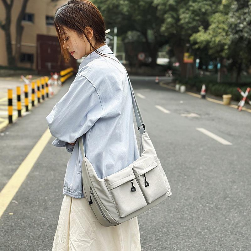 Temperament anti-splashing nylon cloth bag large capacity leisure commuting light dumpling bag sweet wind tooling shoulder bag