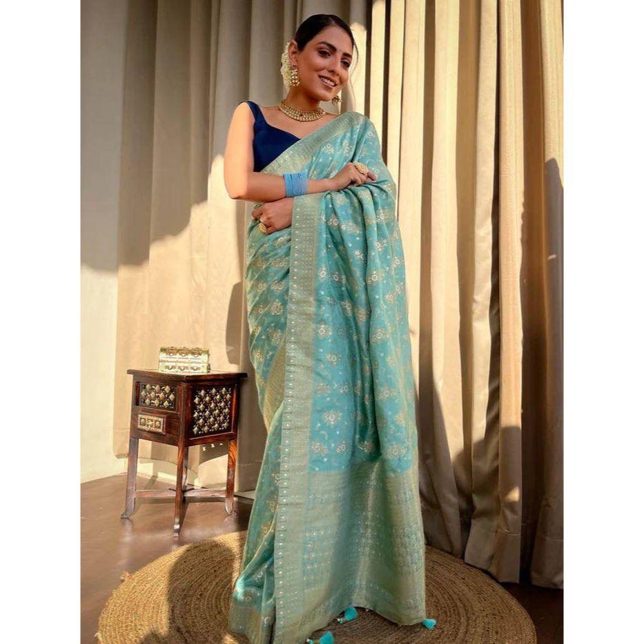 Silk Saree from the ALMAARI Store Is Adorned with Beautiful Zari Work In Form of Traditional Motifs.