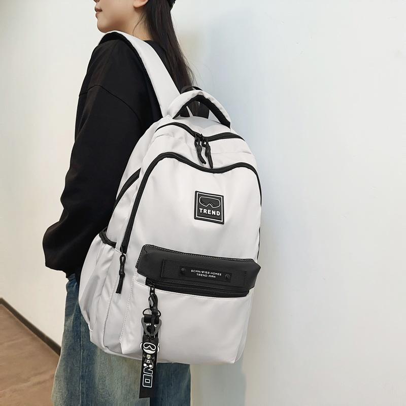 Simple trend large capacity junior high school student schoolbag 25 spring new college style backpack women