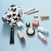Portable Makeup Bag Cow Print Waterproof PU Toiletry Bag Fashionable Zipper Makeup Pouch for Travel