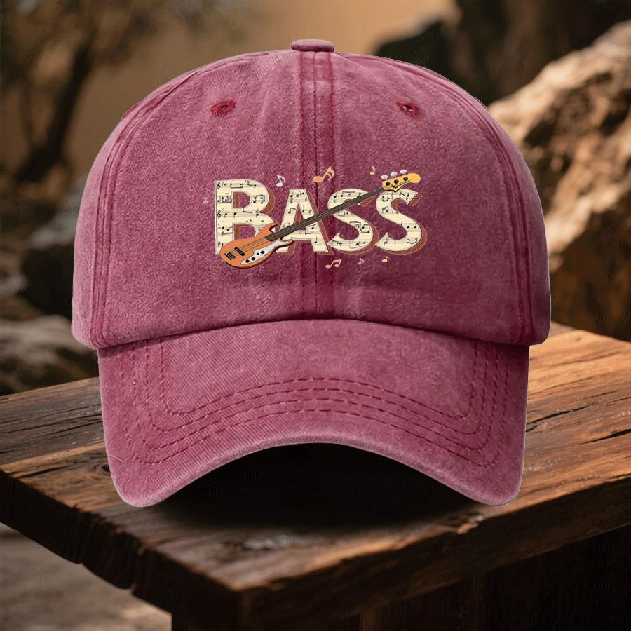 A Cap Featuring The Letters BASS with a Design That Incorporates Musical Notes Bass Guitars And Music Symbols This Stylish