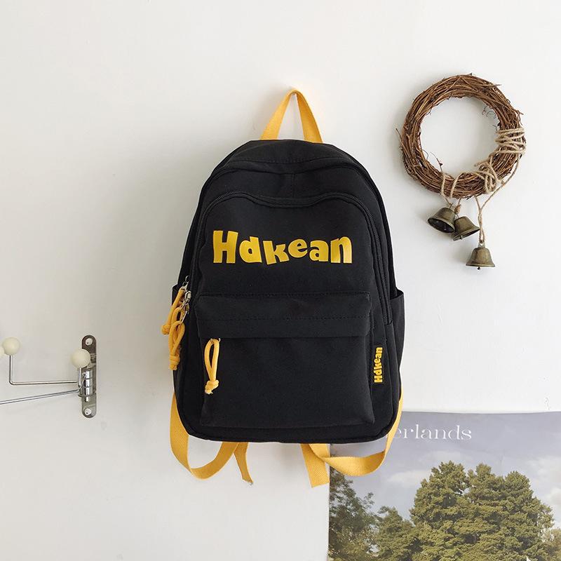 New High-value Solid Color Simple Letter Backpack Couple Casual Lightweight Large-capacity Backpack
