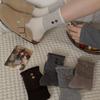 Winter Korean socks women's boneless splicing striped coconut buttons thermal storage heap socks women's socks wool socks