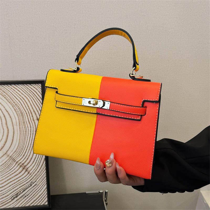 Color Block Kelly Bag: Trendy Two-Tone, Large Capacity, Versatile Shoulder & Crossbody Bag for Work Commute.
