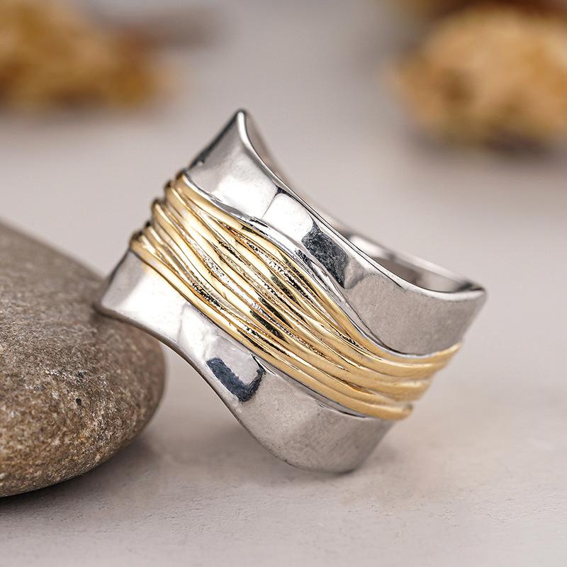 Anillo de viento metálico irregular de dos colores para mujer, diseño simple de línea retro