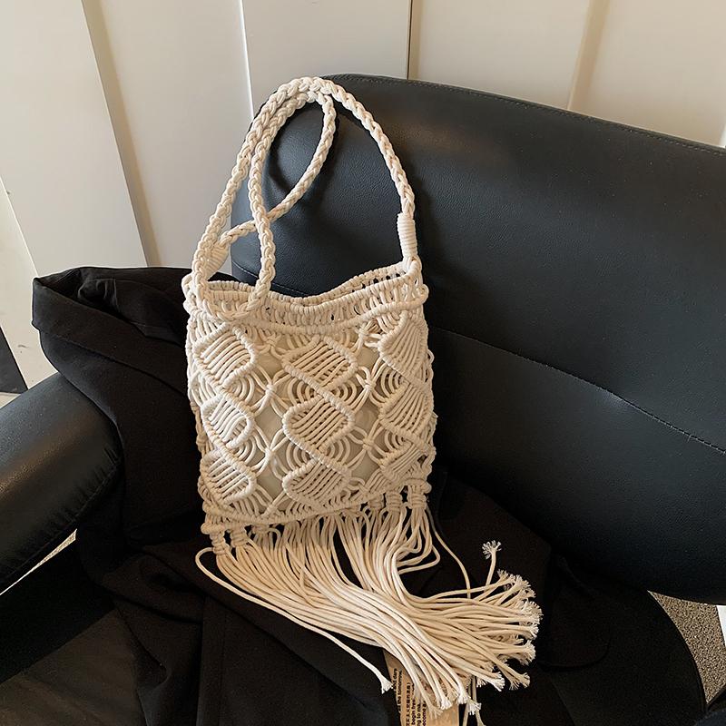 

2026 Summer Bohemian Hollow Out Design Beach Bag Ethnic Style Shoulder Bag Fashion Long Tassel Cotton Thread Woven Crossbody Bag