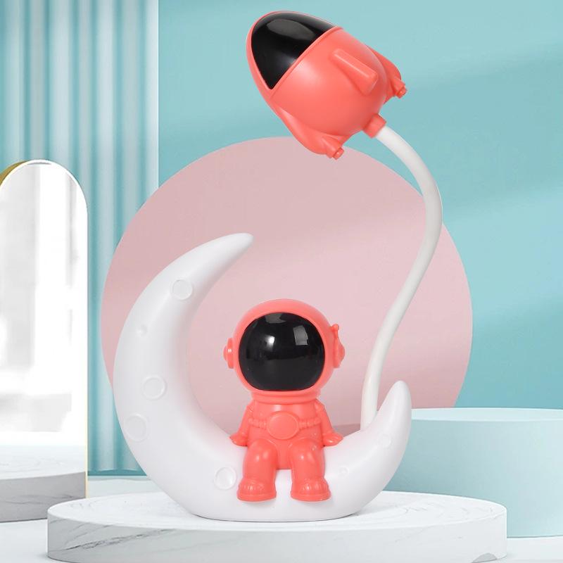 Astronaut LED Night Light: Moon Man Bedside Lamp for Student Dorms, Reading, and Desk Atmosphere.