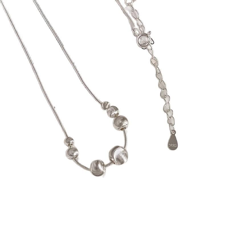 Minimalist Cat-Eye Bead Necklace with Textured Finish Designer Light Luxury Collarbone Chain Niche Minimalist Necklace