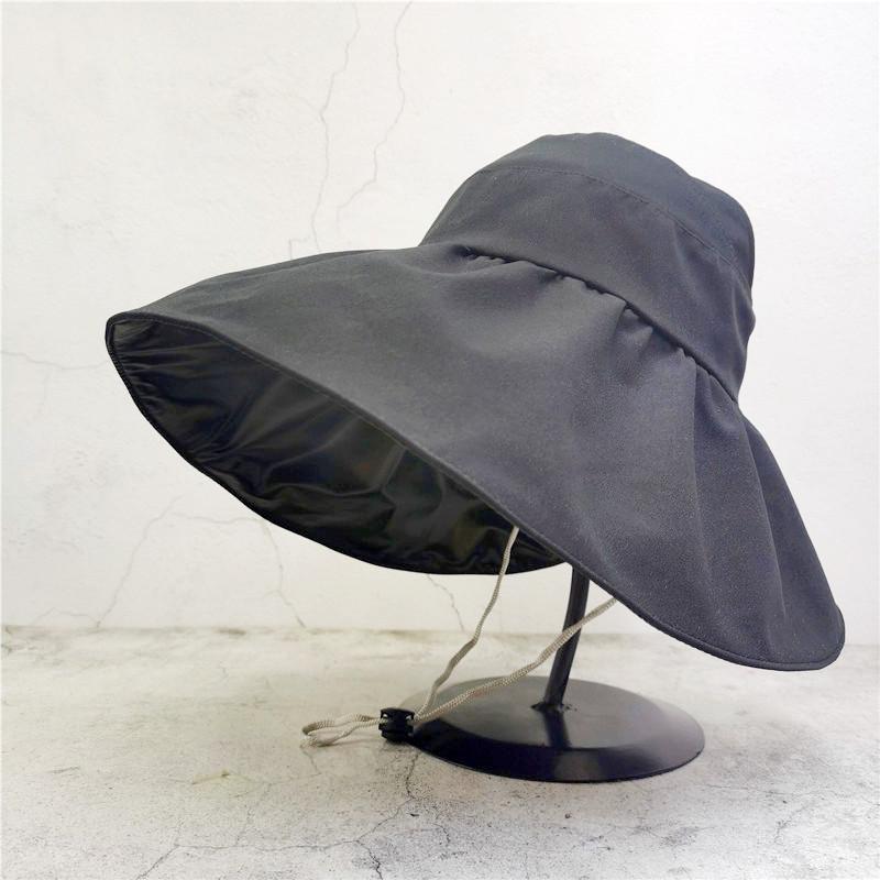 Women's Black Vinyl Bucket Hat with UV Face Shield, Adjustable & Foldable Summer Sun Protection Hat.