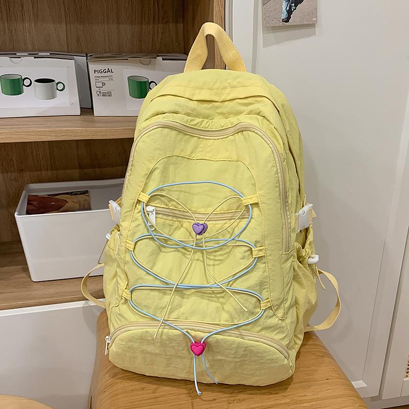

School bag for female junior high school students High value ins Large capacity outdoor travel Mountaineering backpack High school college student bac жёлтый