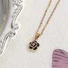 Gold-Plated Clavicle Chain Necklace with Black Enamel Camellia & Center Zirconia