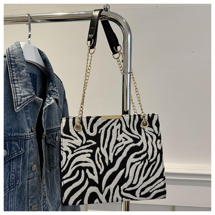 

Трендовый нишевый дизайн, высококлассная ретро-сумка-маленький квадратный клатч с леопардовым принтом, сумка с коровьим принтом, сумка с зебровым принтом зебра печати