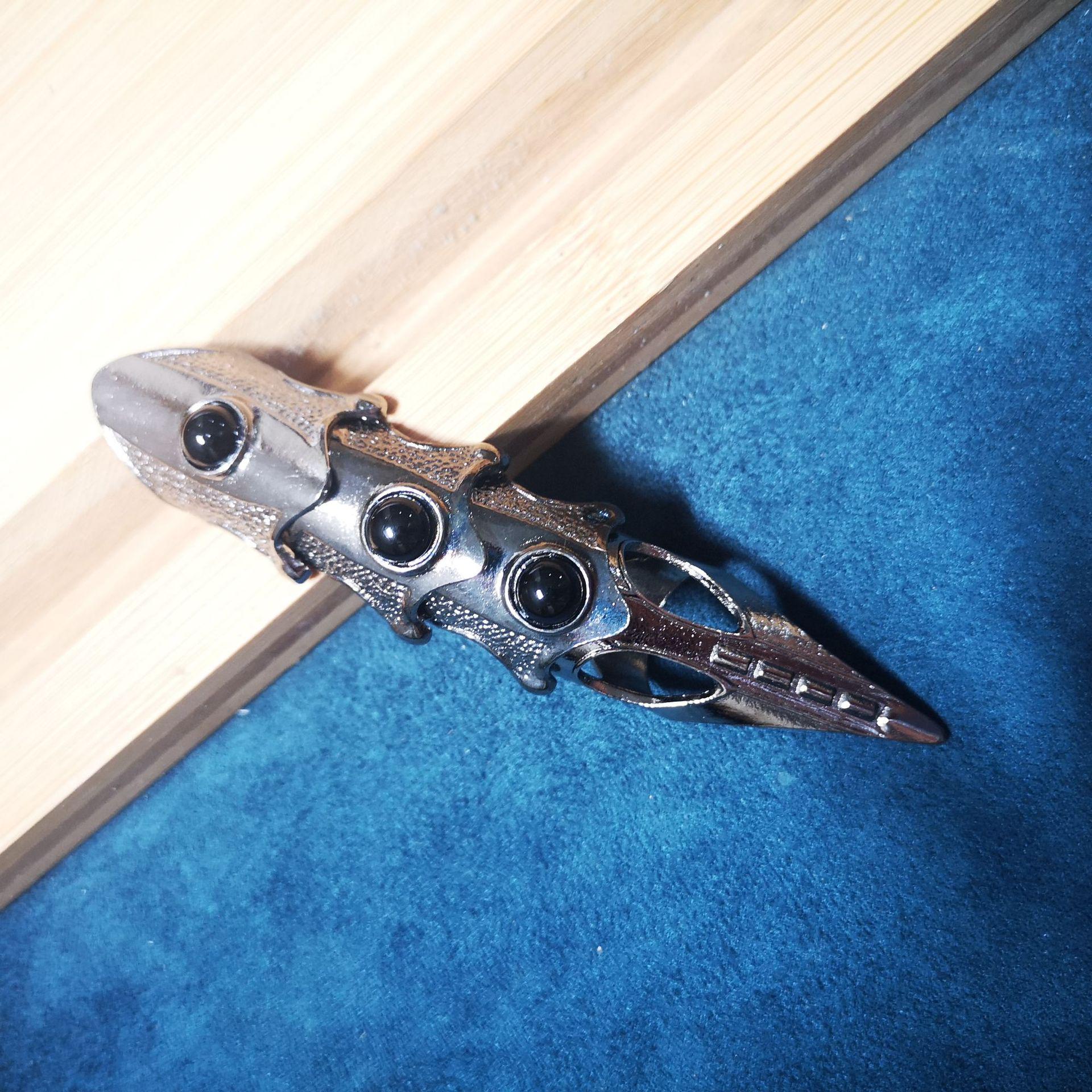 

Европейско-американское панк-рок кольцо с черепом животного и жемчужиной