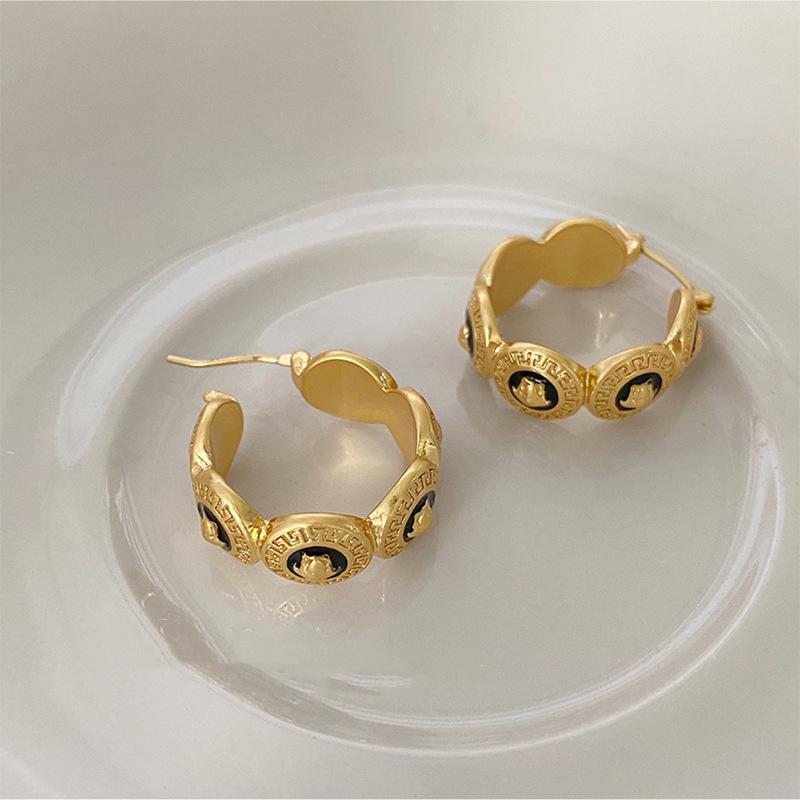 Modische und beliebte mittelalterliche und antike übergroße Ohrringe, personalisierter High-End-Sinn, schwarzer Öltropfen-Ohrschmuck