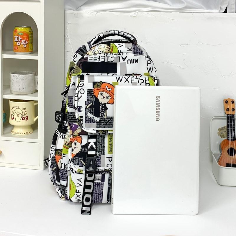 New fashion student schoolbag animation printing trend fashion backpack men and women large capacity simple graffiti backpack