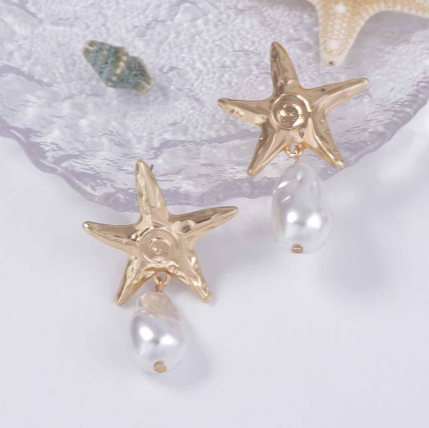 

Новая подвеска из сплава в морском стиле для отдыха и отпуска, в виде морской звезды с имитацией жемчуга, - это простое, модное и универсальное украшение для ушей.