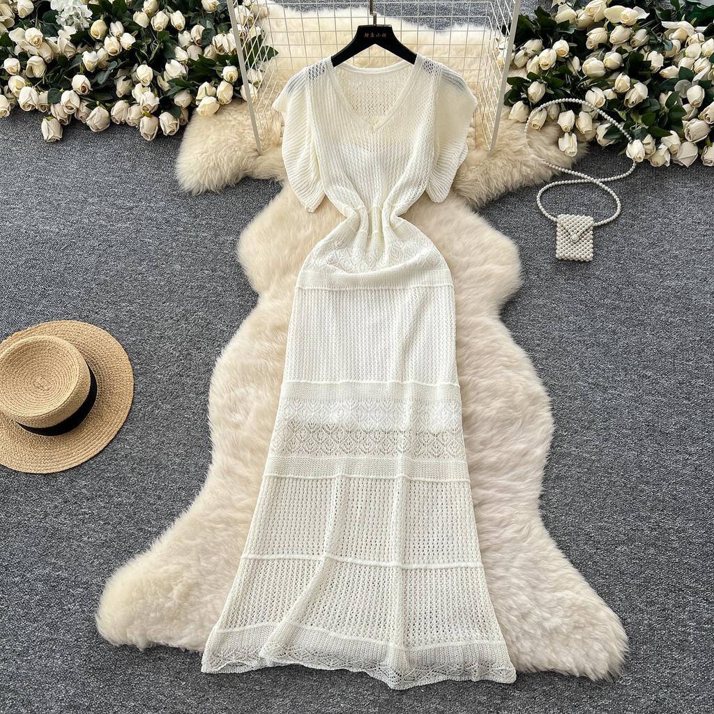 Wear women's high-end sense hollow crochet waist small fly sleeve knitted dress with suspender skirt two-piece set