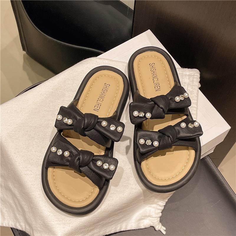 

Summer slippers women wear new thick-bottomed fairy bow pearl 2025 fashion open-toed cool slippers 40 чёрный