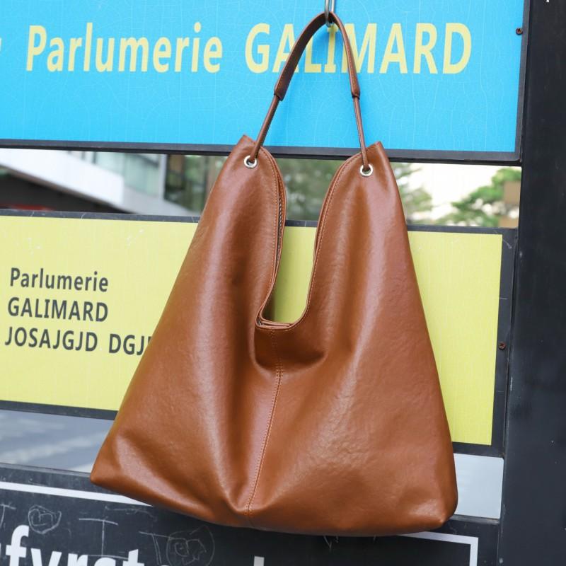 2025 Vegetable Tanned Cowhide Popular Large-capacity Tote Bag All-matching One-shoulder Class Armpit Commuter