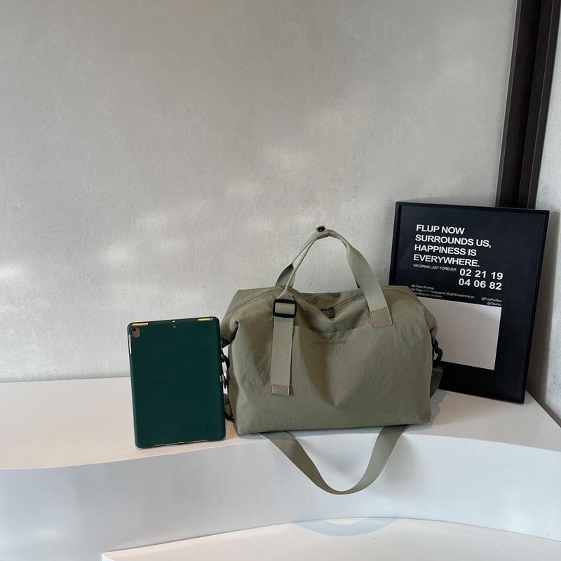 Short-haul general travel bag, simple business trip boarding bag, trendy fitness yoga bag, Hong Kong style commuter messenger bag