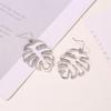 Ethnic Style Retro Hollow Leaf Stud Earrings - Banana Leaf Design for Women