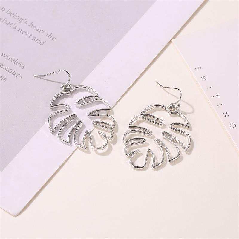 Ethnic Style Retro Hollow Leaf Stud Earrings - Banana Leaf Design for Women