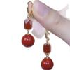 2025 Elegant Red Pearl Earrings: Modern Luxury for Winter