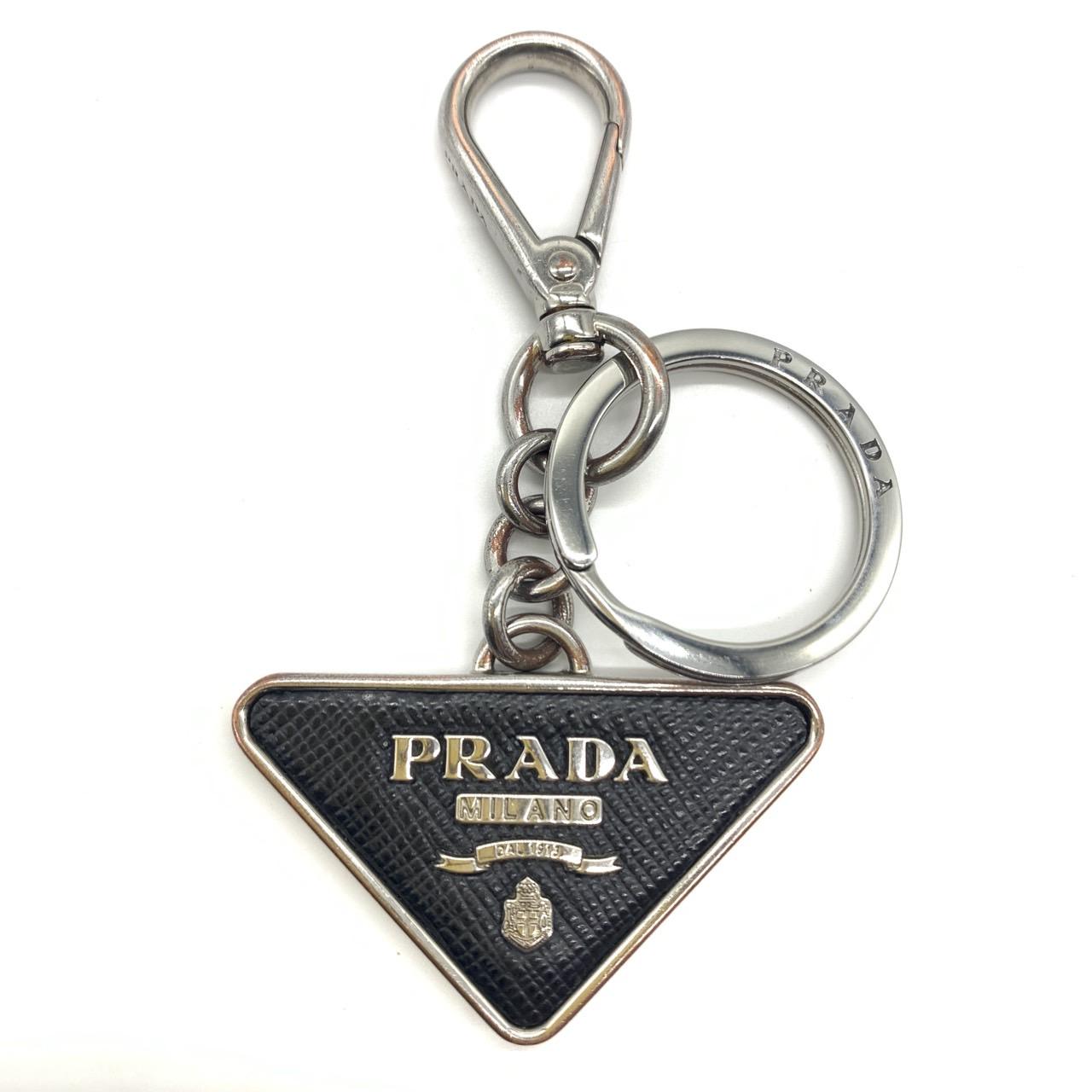 Б/у брелок PRADA черный металл унисекс