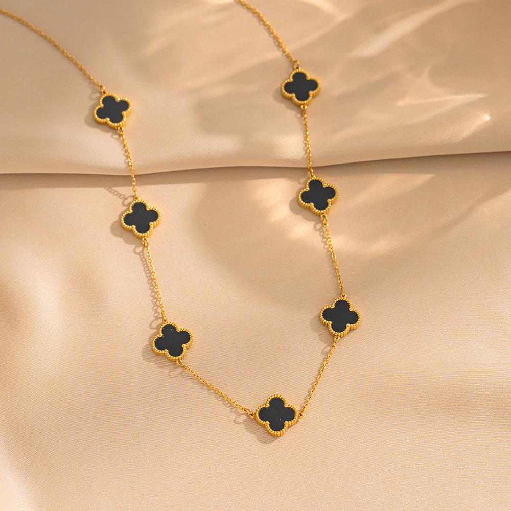 

Двусторонняя подвеска-клевер из титановой стали с покрытием из 18-каратного золота и перламутром