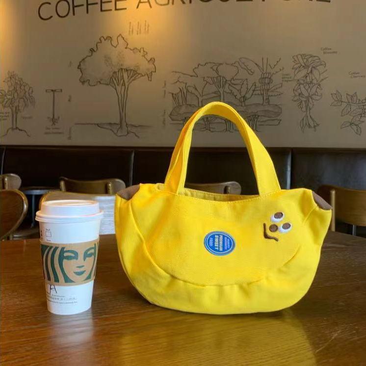

Charming Cartoon Canvas Handbag: Easy-to-Carry Office & Mom Tote for Sundries