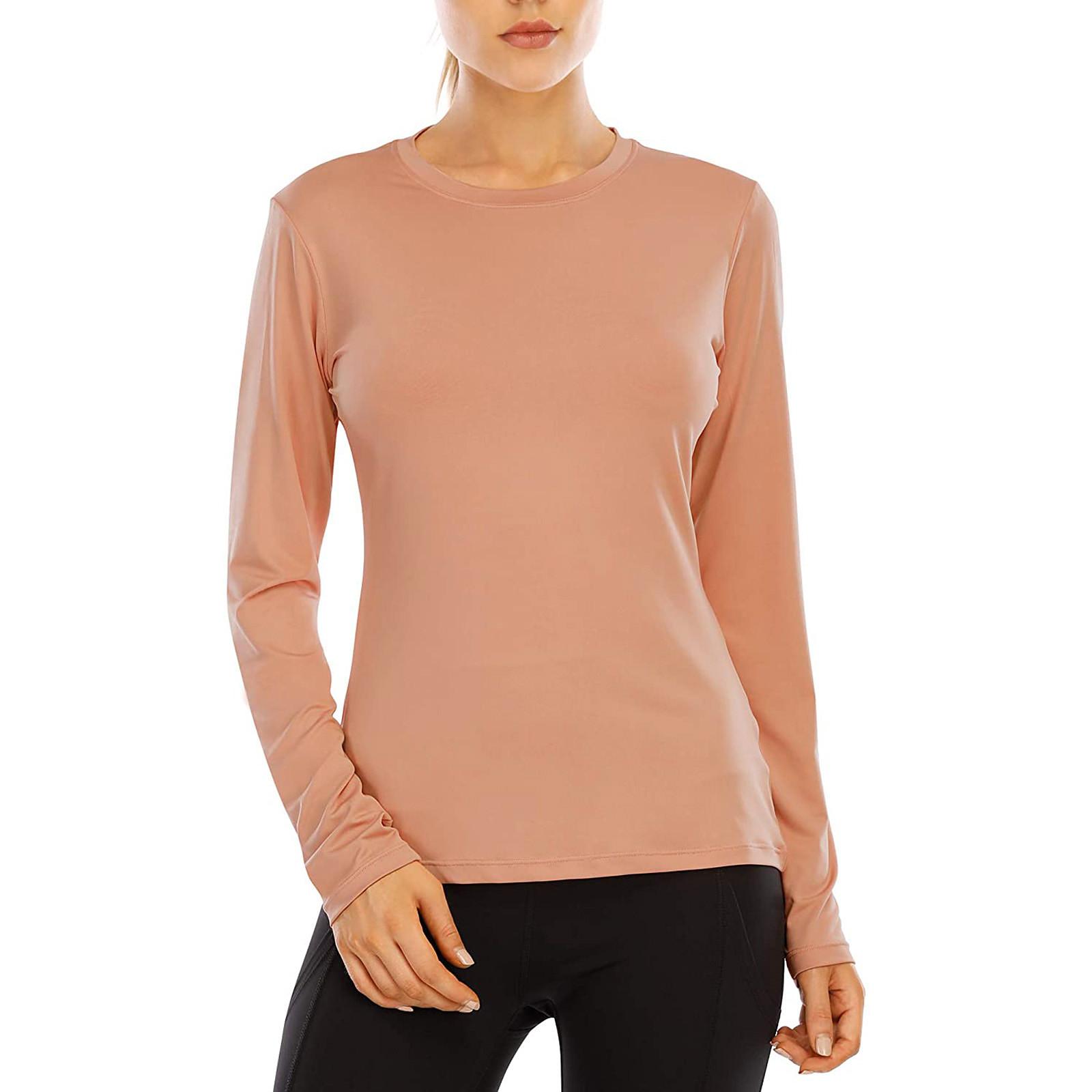 

Жіноча облягаюча однотонна сонцезахисна фітнес-футболка з довгим рукавом M помаранчевий