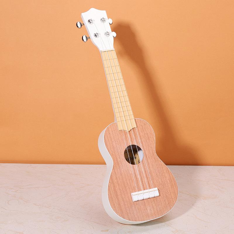 Milky White Peach Core Solid Wood Ukulele with High Aesthetic Appeal